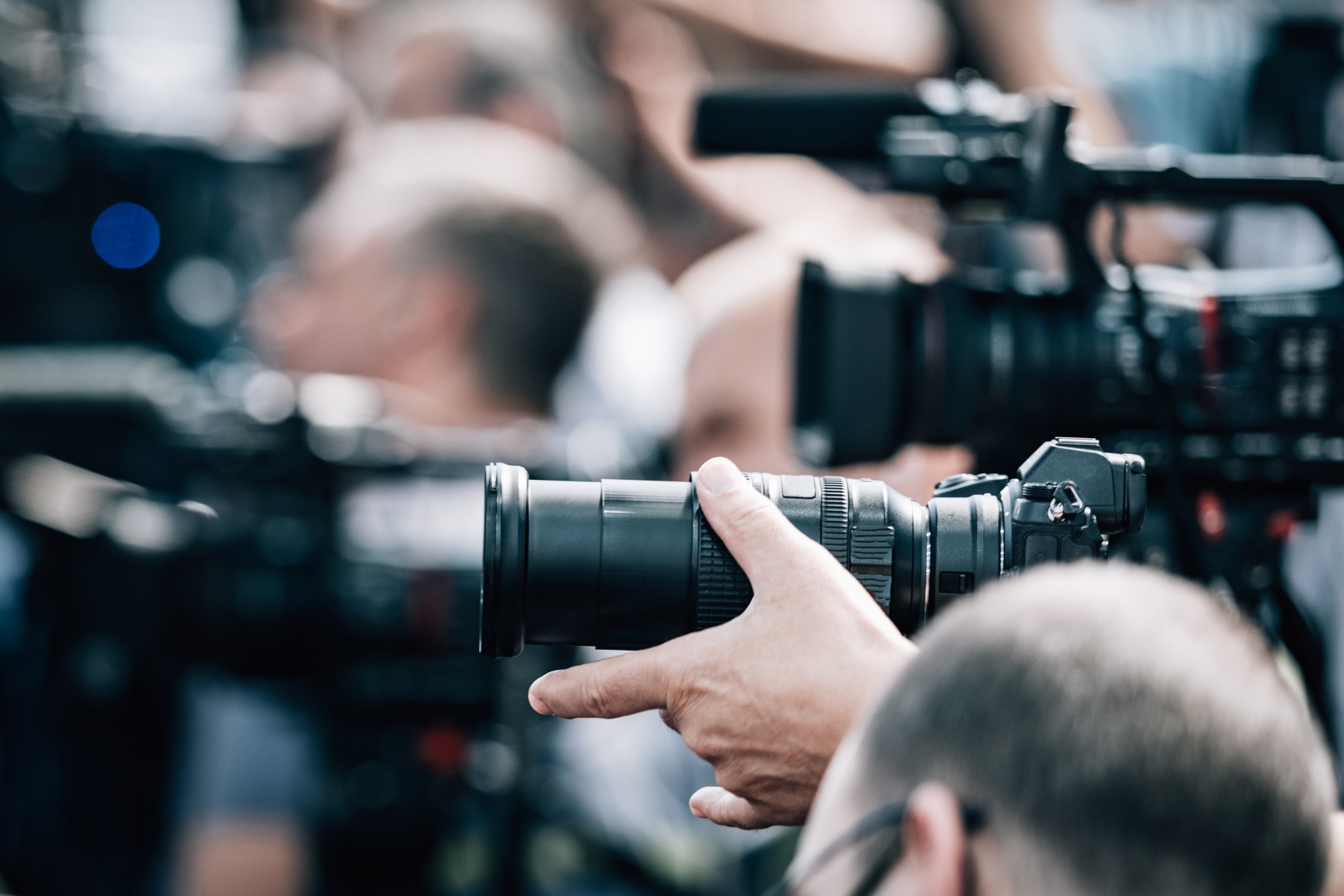 Live streaming. Camera at a Press Conference.